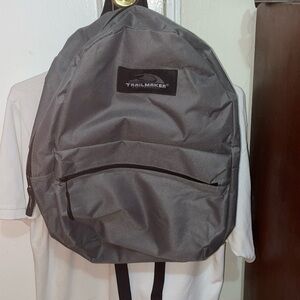 Gray trailmaker  backpack.​